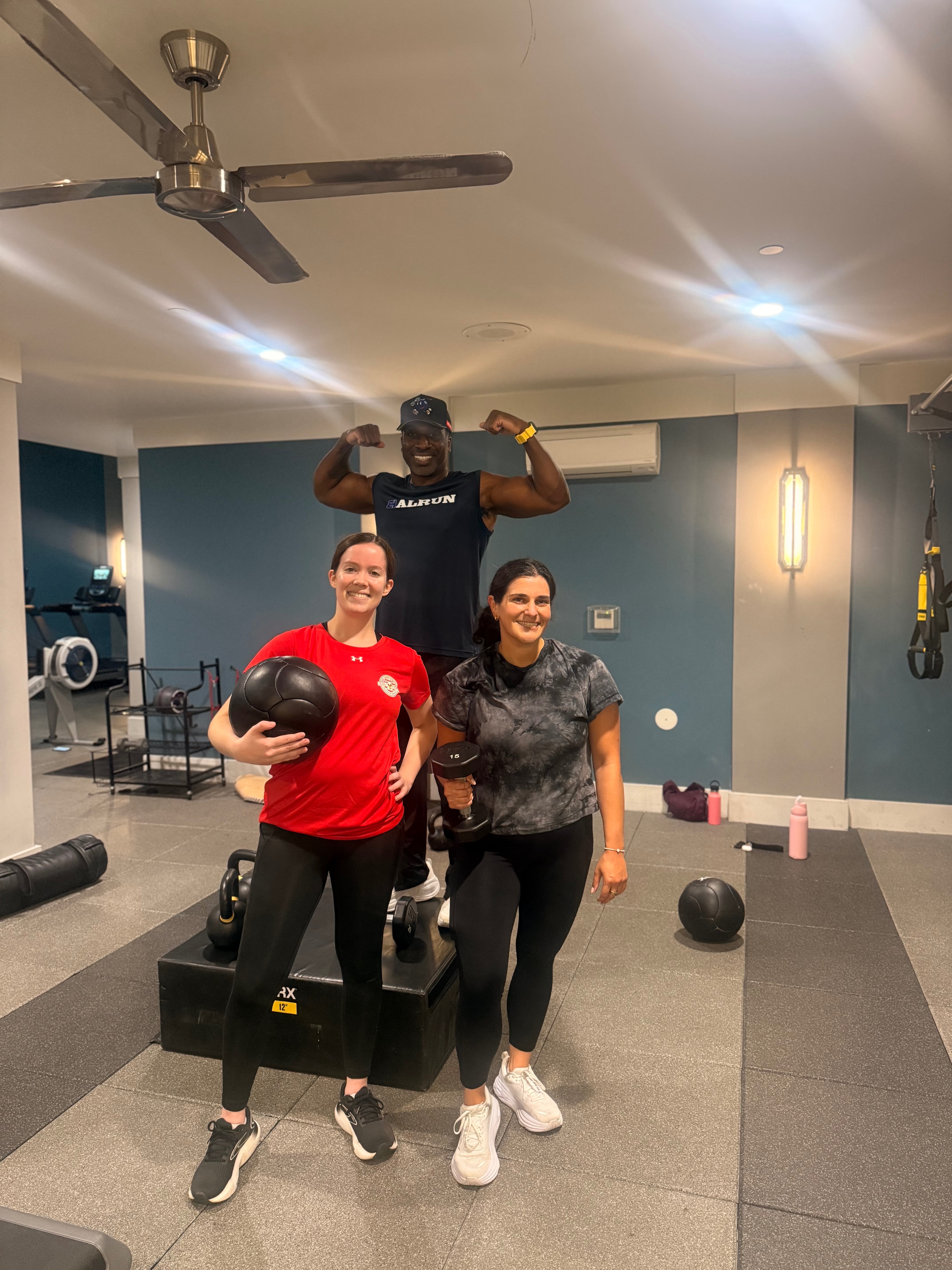 Forever Strong residents with Coach Pat in gym