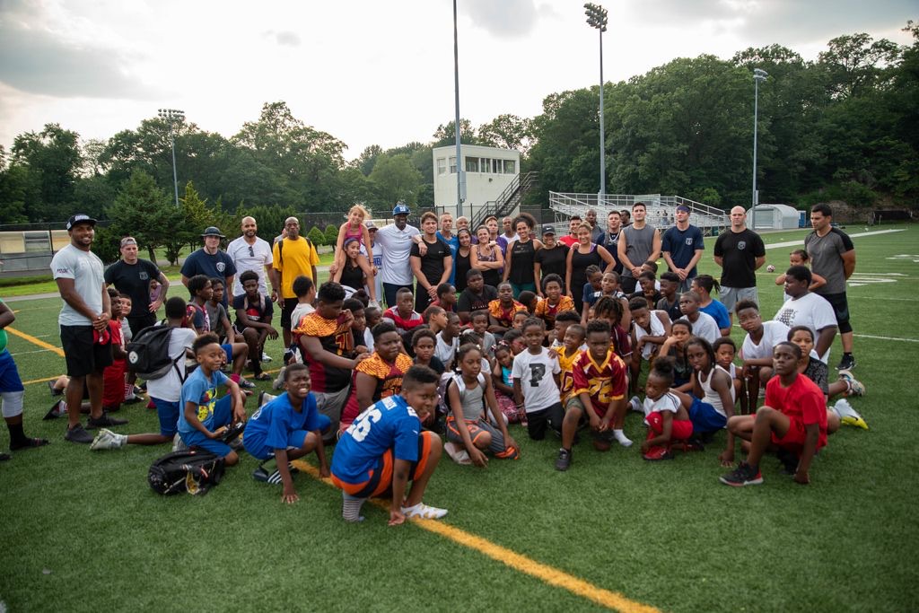 BALRUN youth sports program group photo on athletic field
